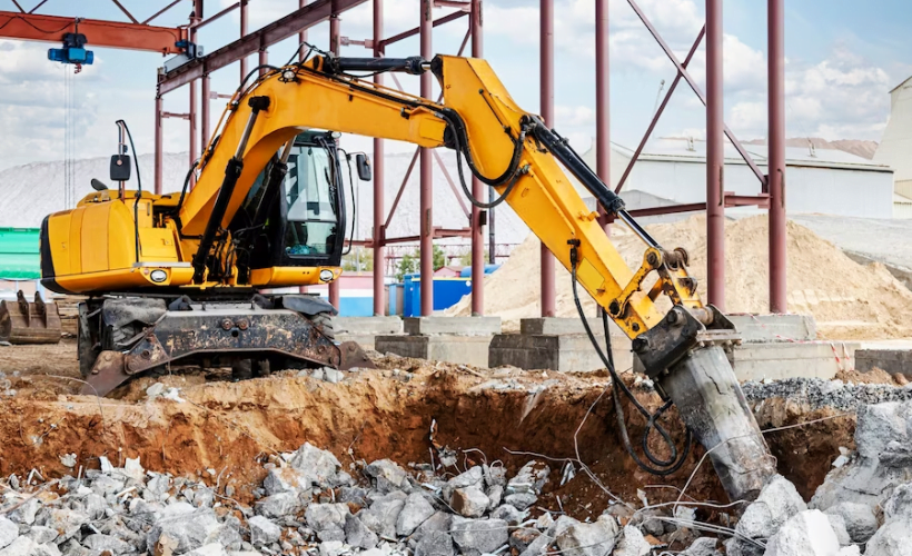 Clearing rocks with big equipment